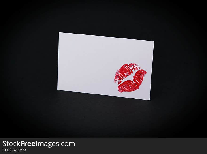 A kiss on a business card