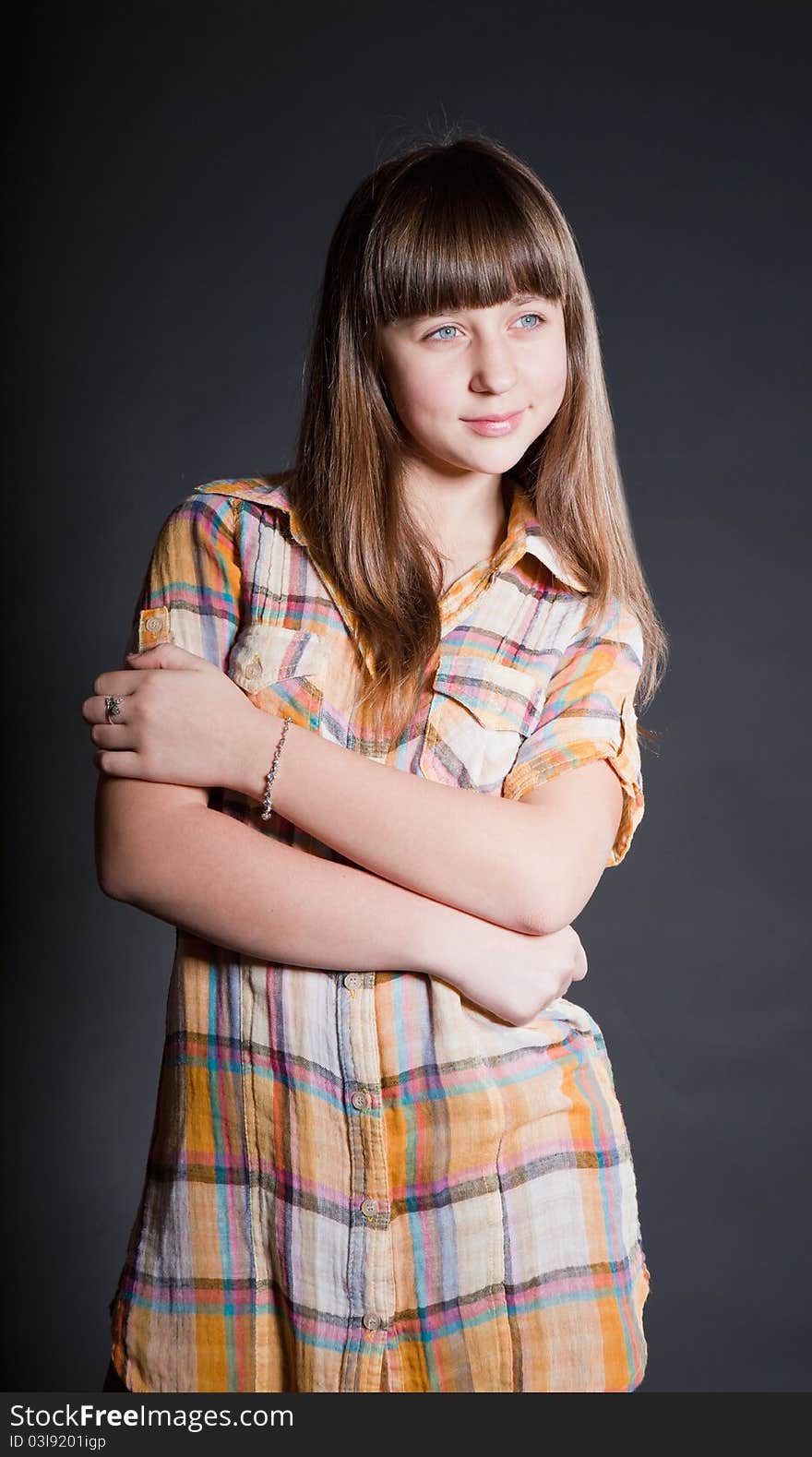 Portrait of a beautiful  girl with long hairs and clean skin of the face