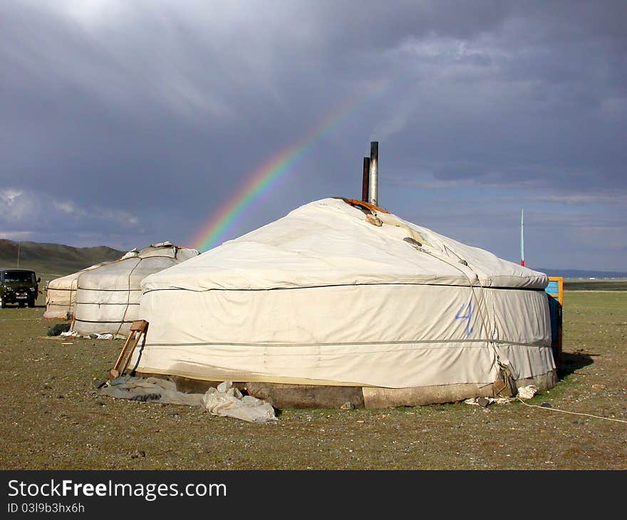 Mongolian gers with rainbow