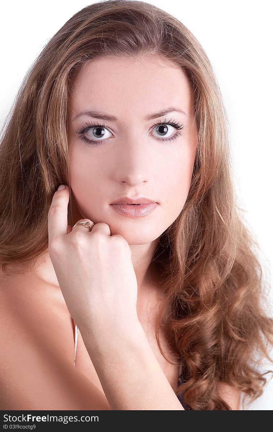 Portrait of a beautiful girl with long hair