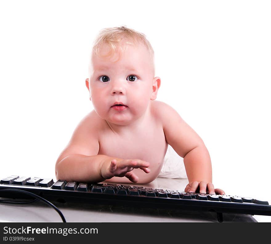 Little child holding keyboard isolated over white