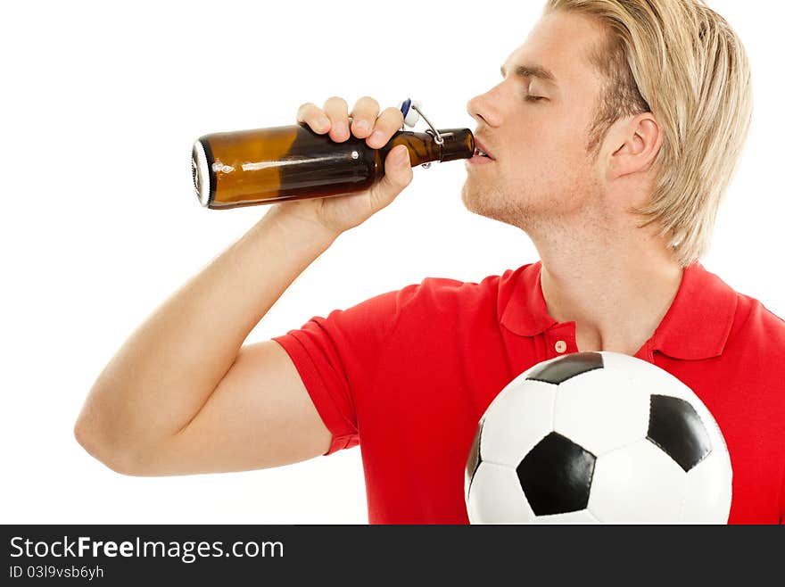 Blond man drinking a beer. Blond man drinking a beer