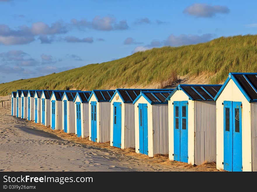 A row of cabins on the beach