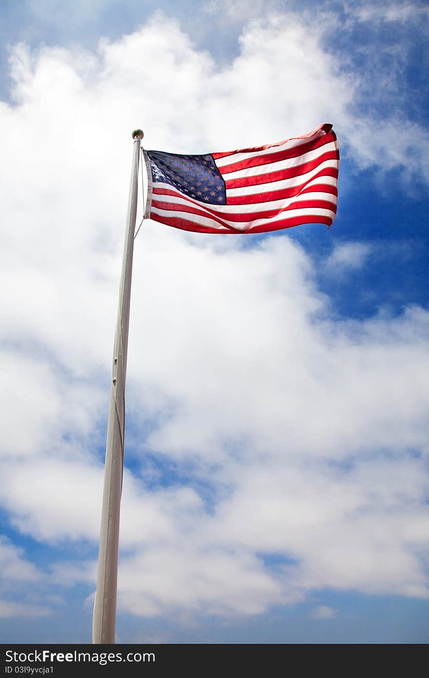 American flag against blue sky