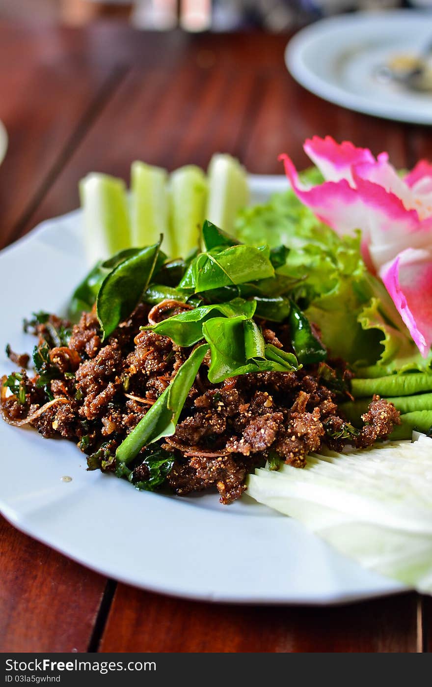 Spicy fried pork with vegetables , Thai style food