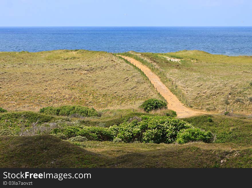 Sand dunes and sea