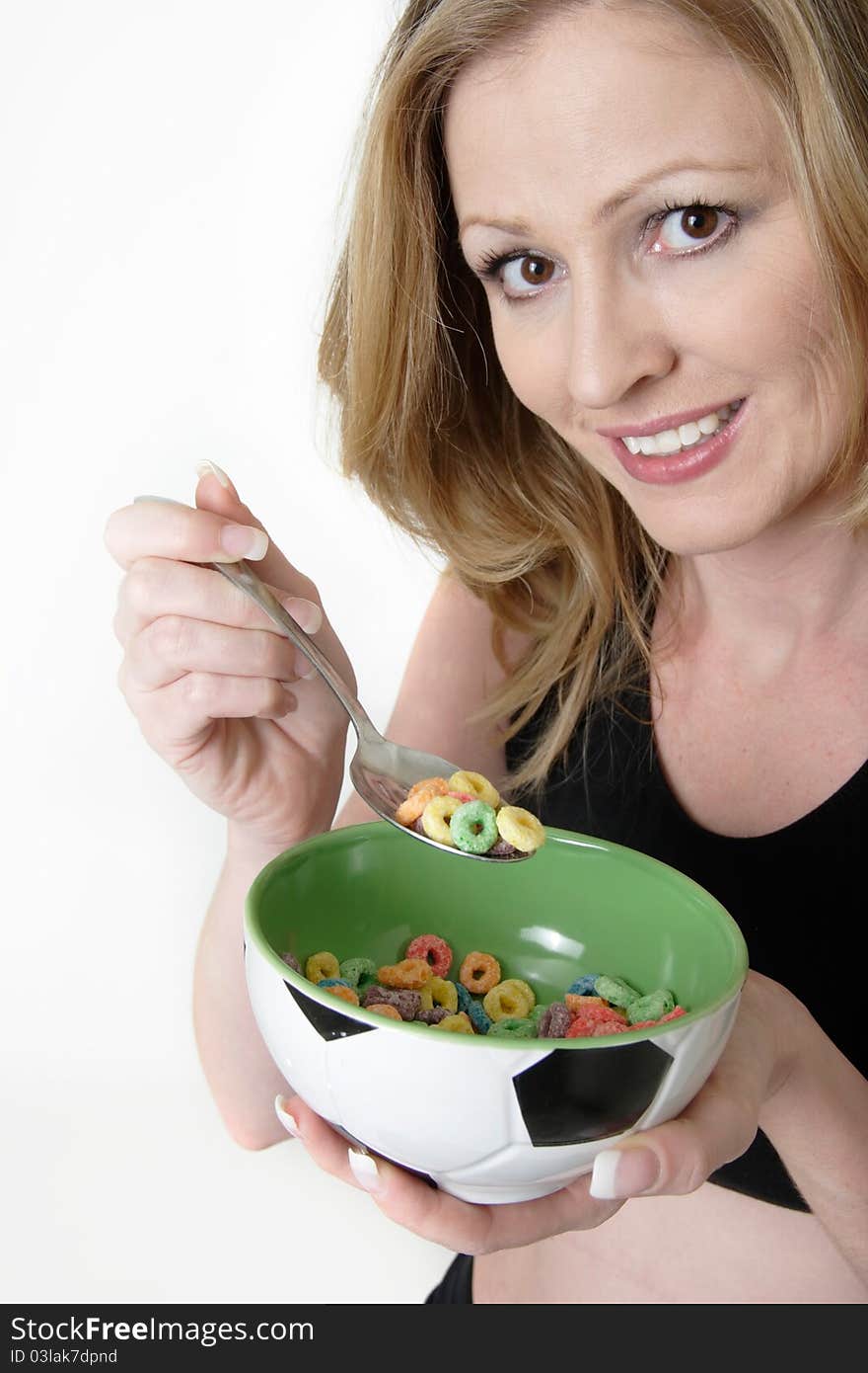 Woman eating a bowl of cereal