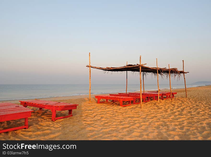 View of exotic bamboo hut on tropical beach. View of exotic bamboo hut on tropical beach