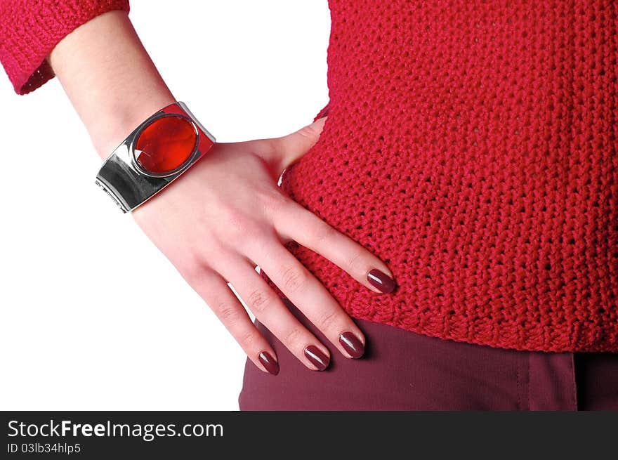 Female hand wearing bangle touching the waist. Female hand wearing bangle touching the waist