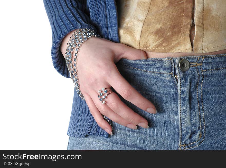 Girl wearing jeans and bangle touching the waist