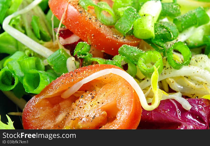 Fresh salad closeup as background