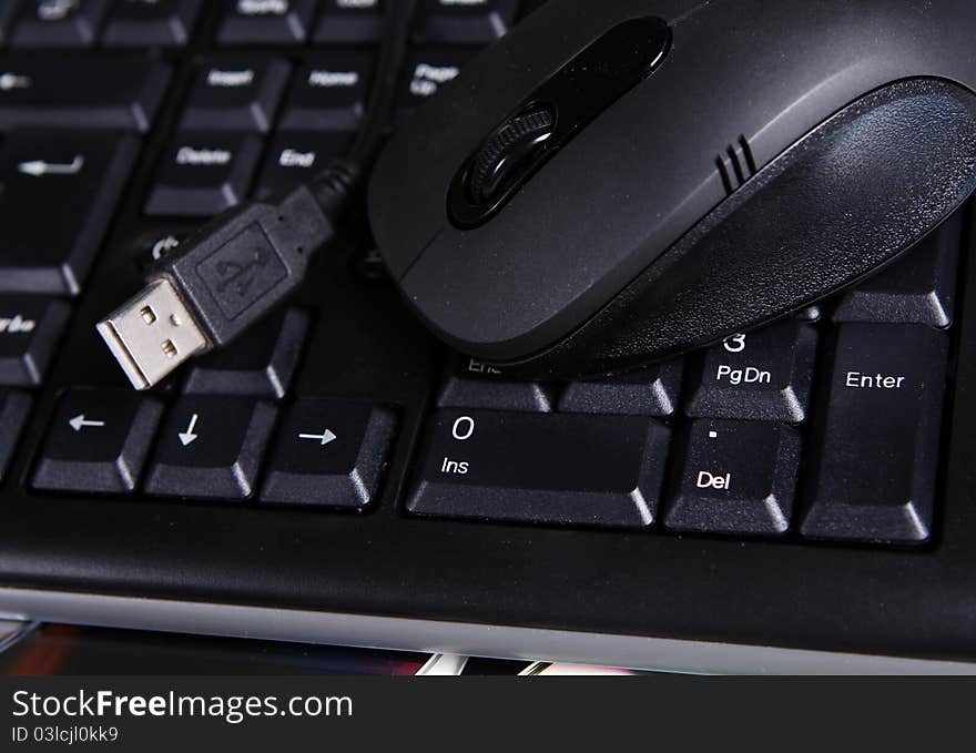 Close up of keyboard with usb mouse. Close up of keyboard with usb mouse
