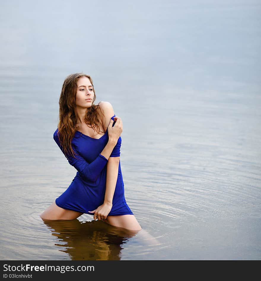 Portrait of beautiful girl in wet white shirt. Portrait of beautiful girl in wet white shirt