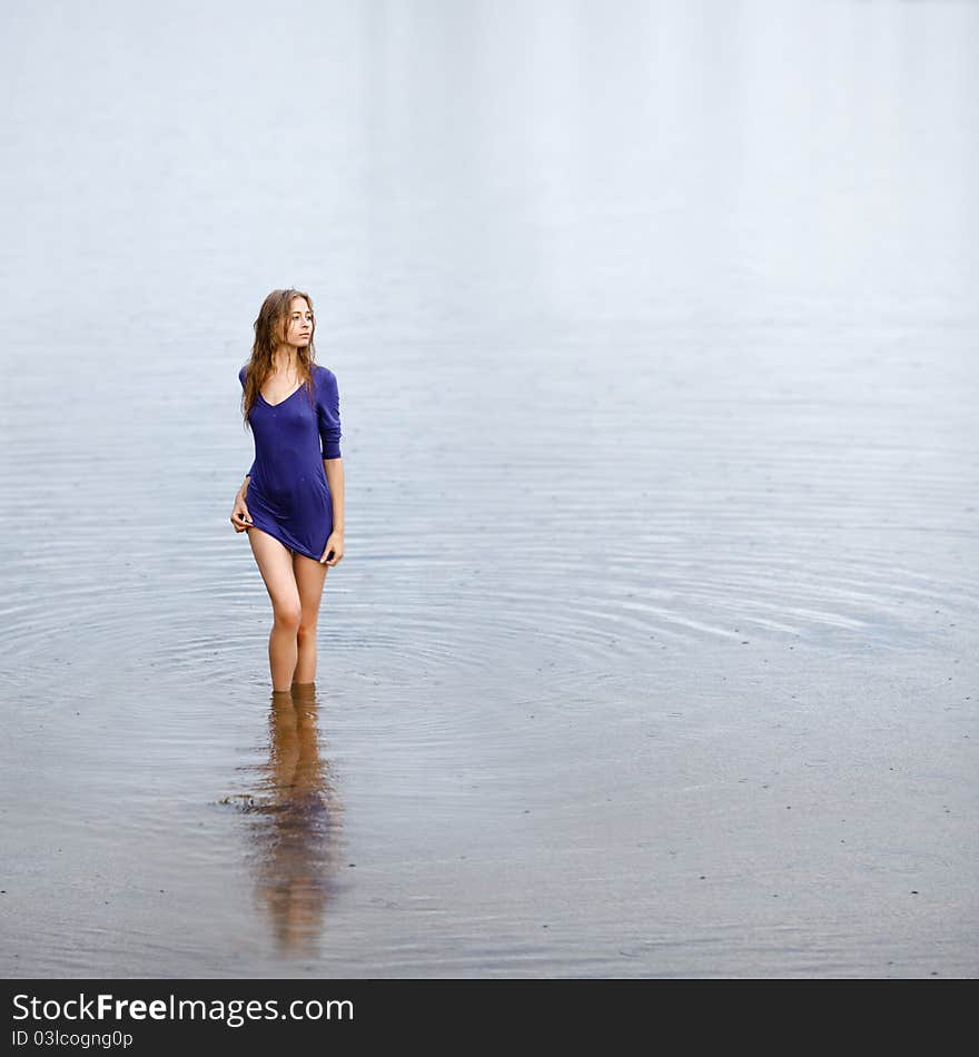 Portrait of beautiful girl in wet white shirt. Portrait of beautiful girl in wet white shirt