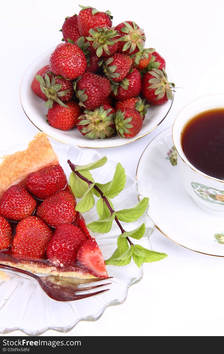 Strawberry tart, fruits and a cup of tea. Strawberry tart, fruits and a cup of tea