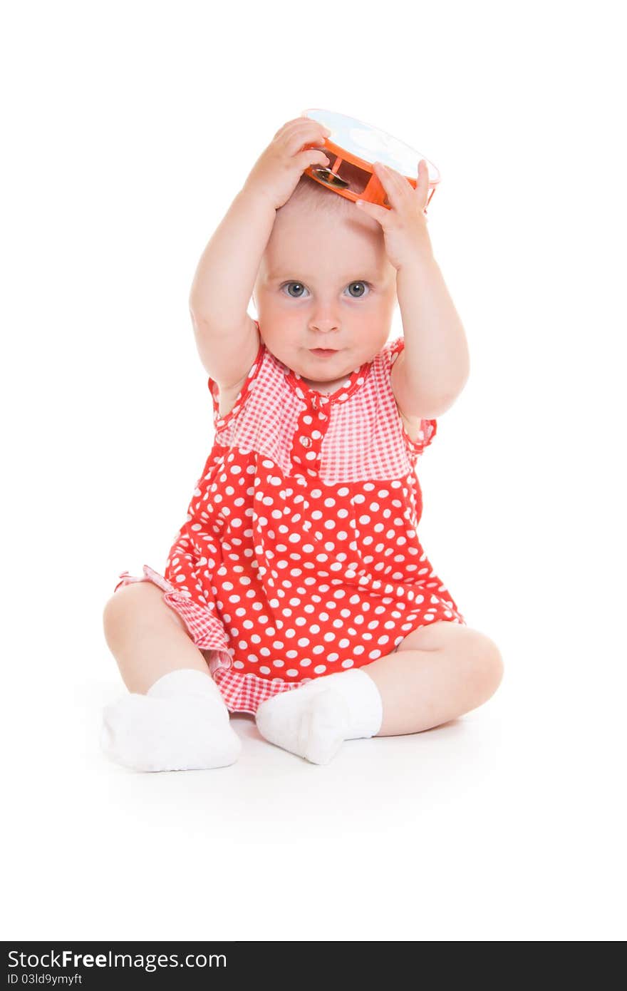 Baby in dress on a white background.