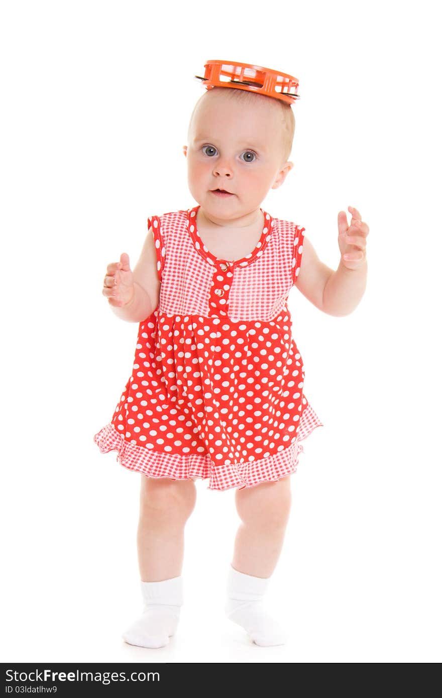 Baby in dress on a white background.