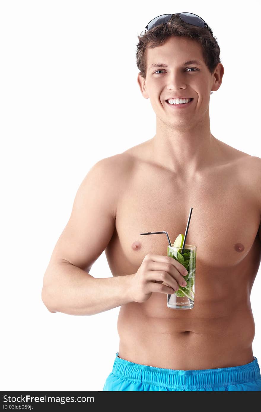 A young man with a cocktail on a white background