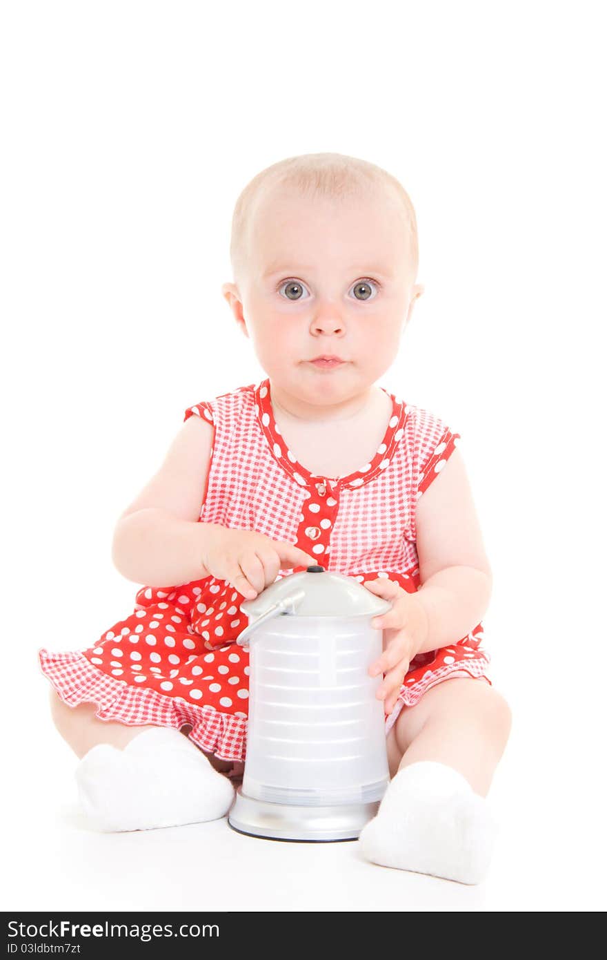 Baby in dress on a white background.