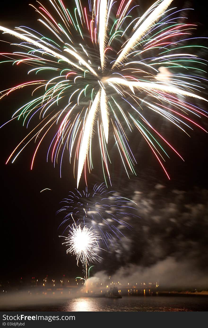 Beautiful Colorful Fireworks In Night Sky.