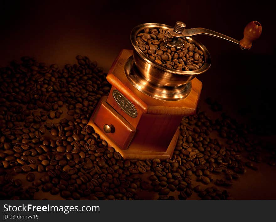 Coffee grinder with beans.