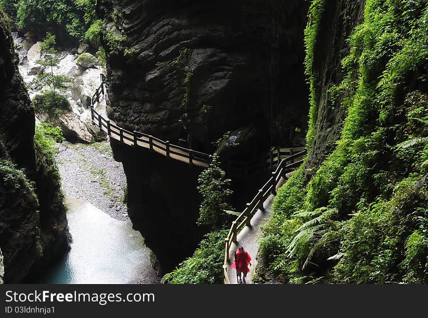 Plank road built along a cliff beside in Yunnan China