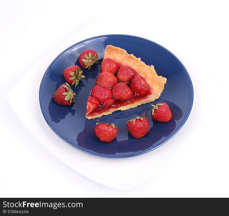 Piece of Strawberry Tart decorated with strawberries