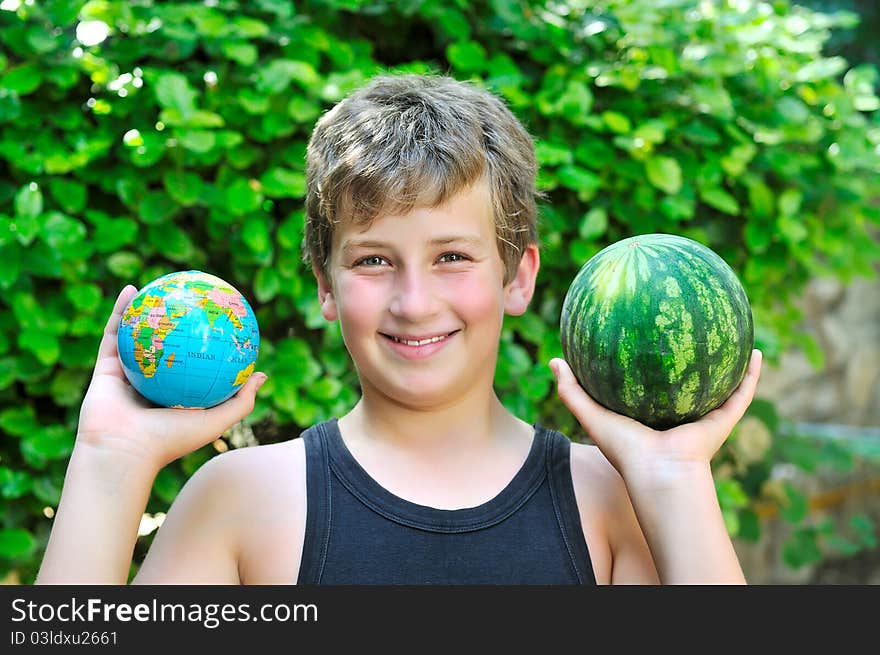 Boy With A Watermelon And A Globe