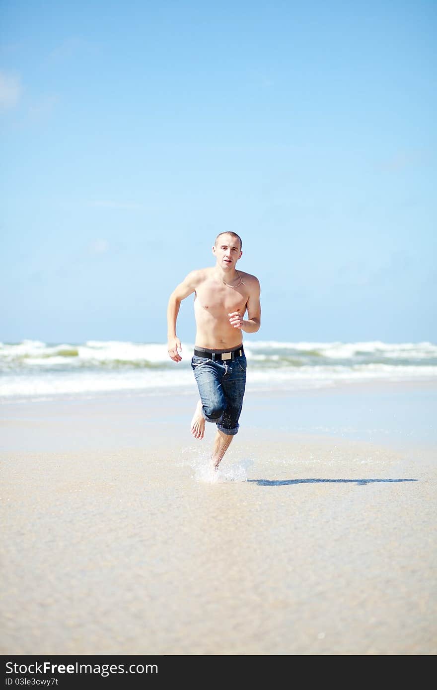 Handsome man on the sanny beach. Handsome man on the sanny beach