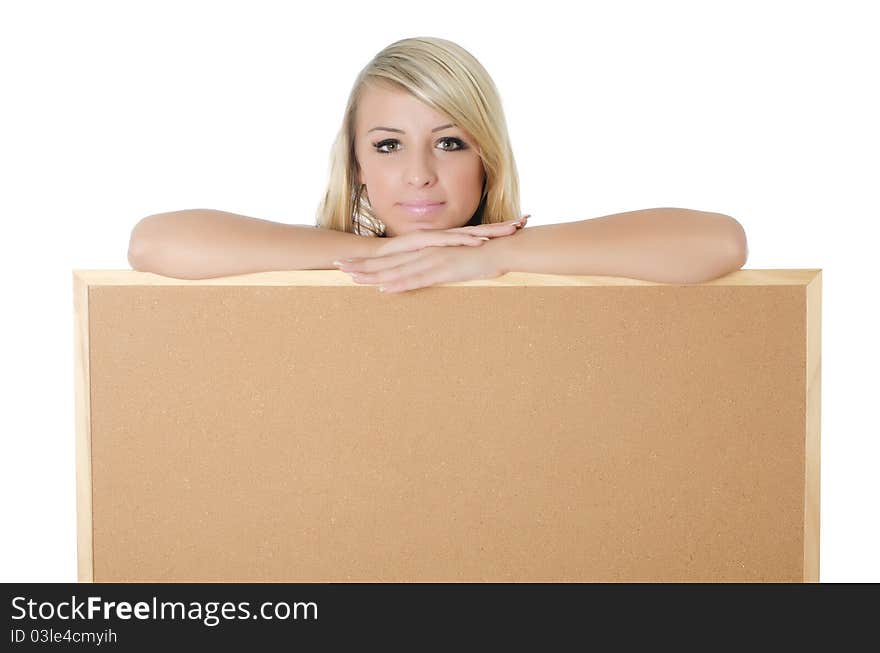 Woman holding a blank corkboard