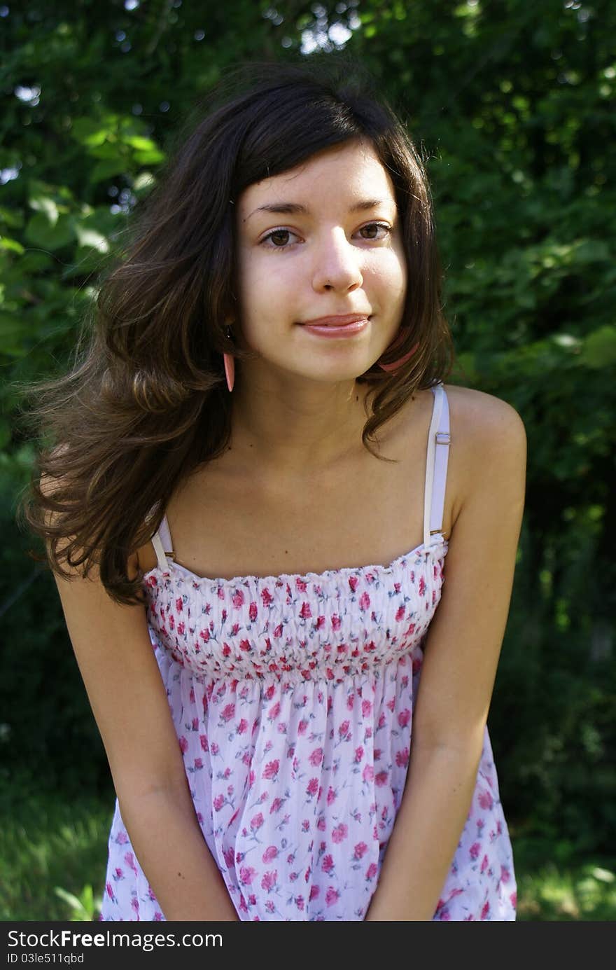 Pretty girl in a summer forest