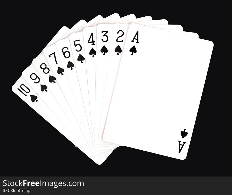 Playing cards isolated on black background