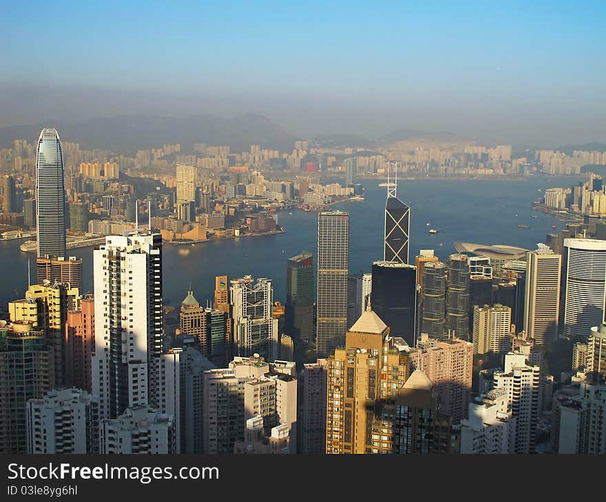 Cityscape of Hong Kong skyscrapers and skyline near the Victoria harbor.