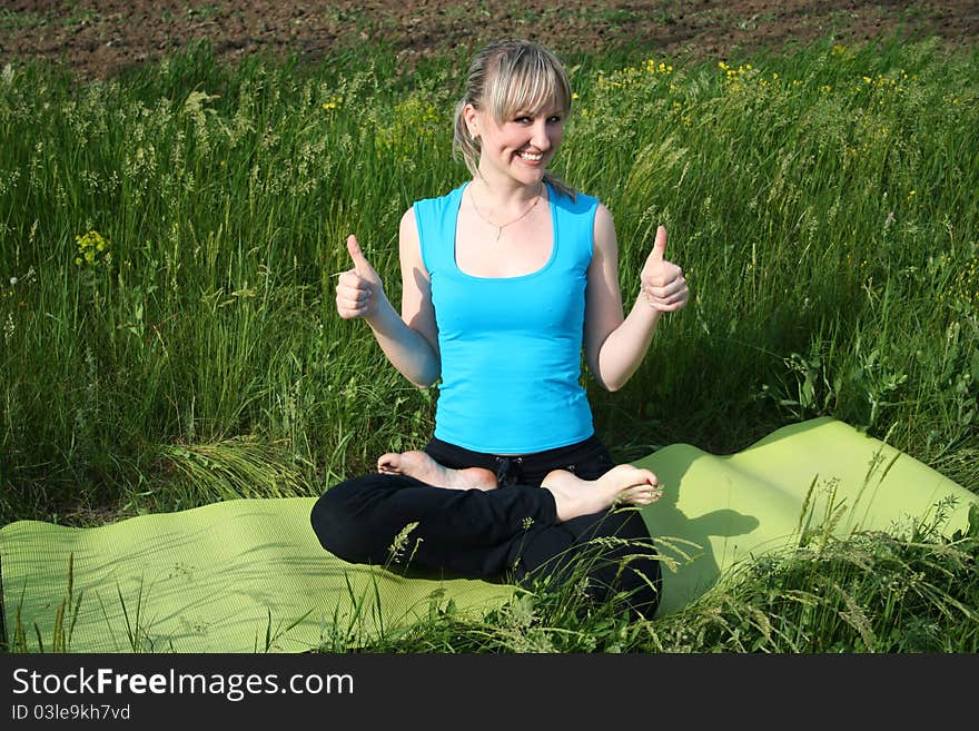 Woman showing thumbs up