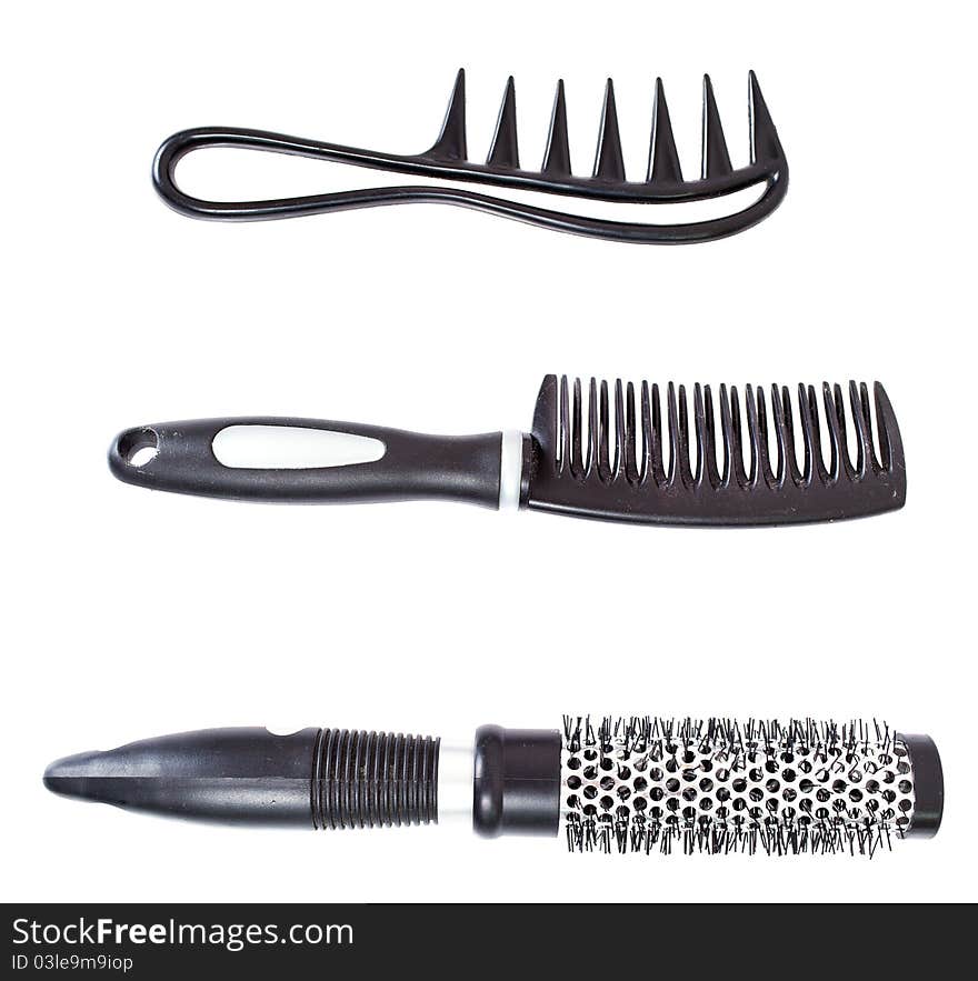 Three hairbrushes on white background