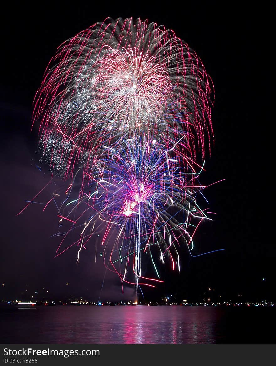 Colorful Fireworks Over The Lake