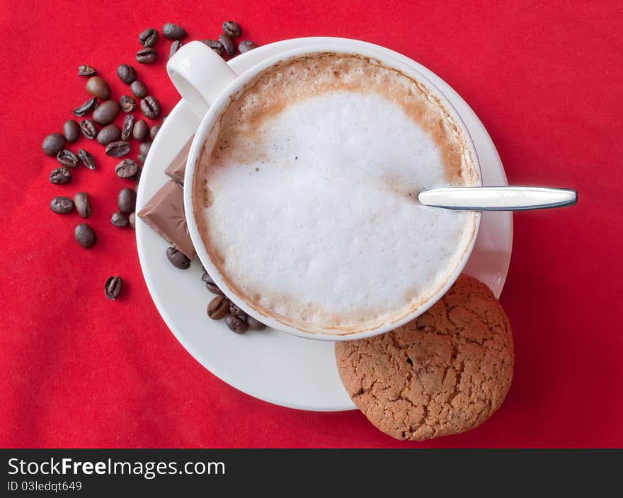 Cappuccino, cookie and beans