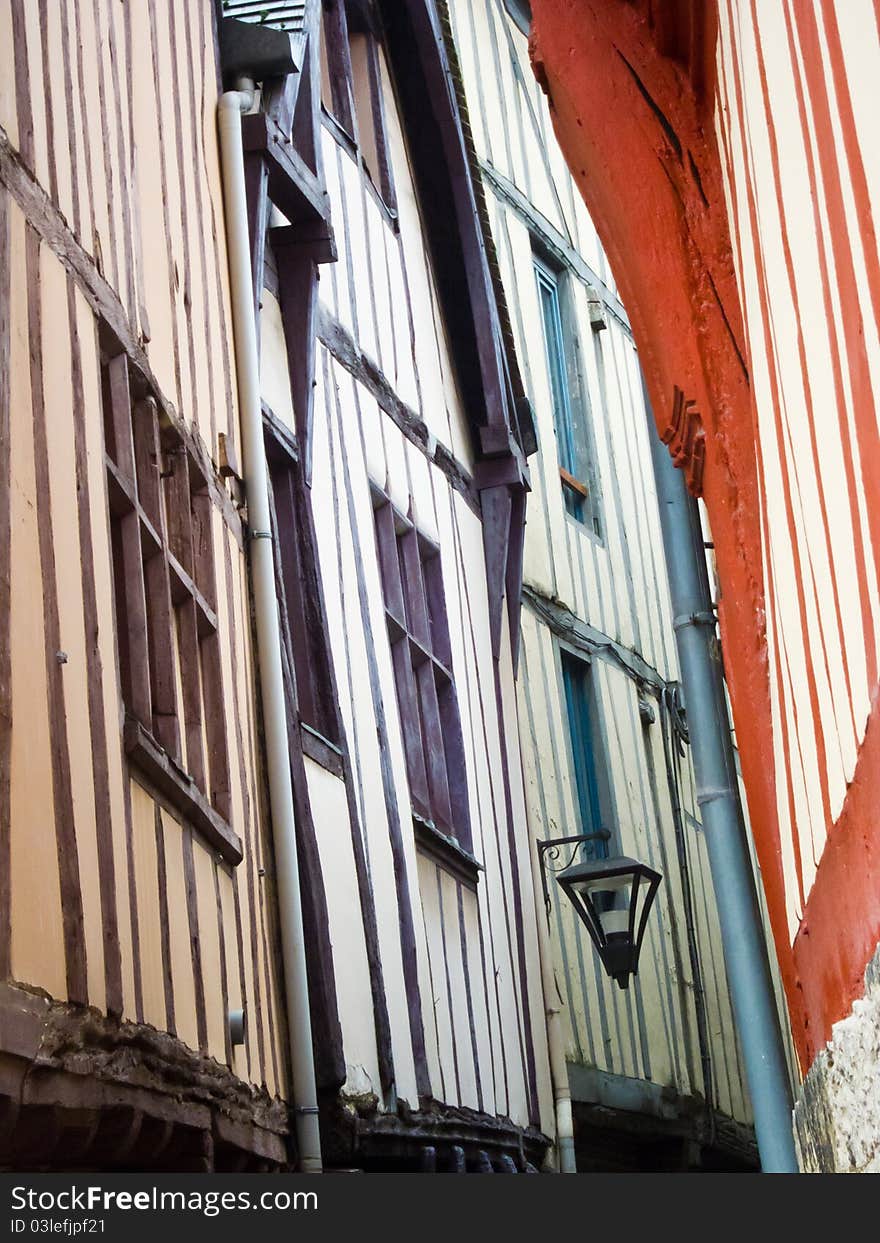 Colorful buildings in the narrow streets of Rouen, ont of the most famous cities in the Normandy, France. Colorful buildings in the narrow streets of Rouen, ont of the most famous cities in the Normandy, France.