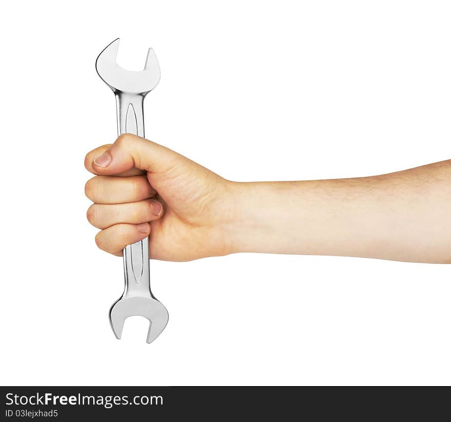 Metal spanner in hand isolated on white background