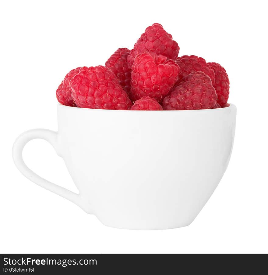 Ripe raspberry in cup