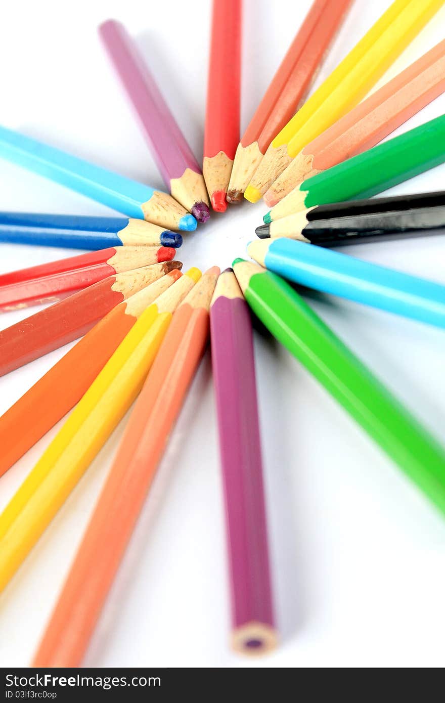 Colored pencils forming a color circle. Colored pencils forming a color circle.