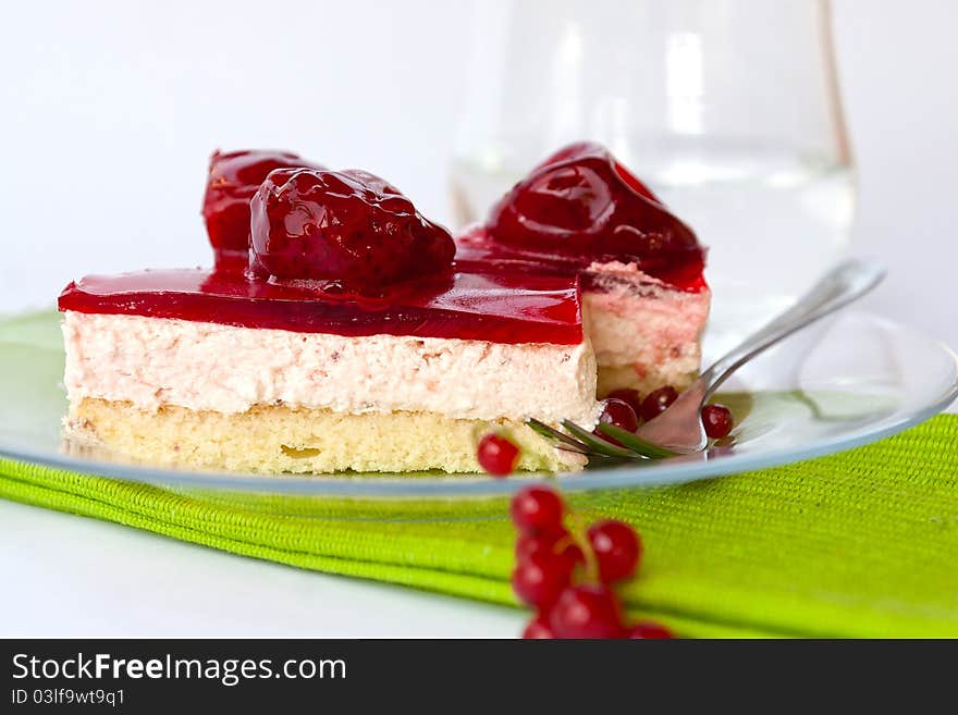 Fruit cake with strawberry and red currant