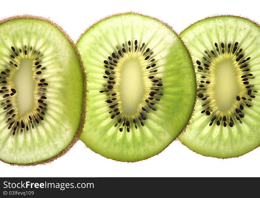 Kiwi fruit slices on whit background