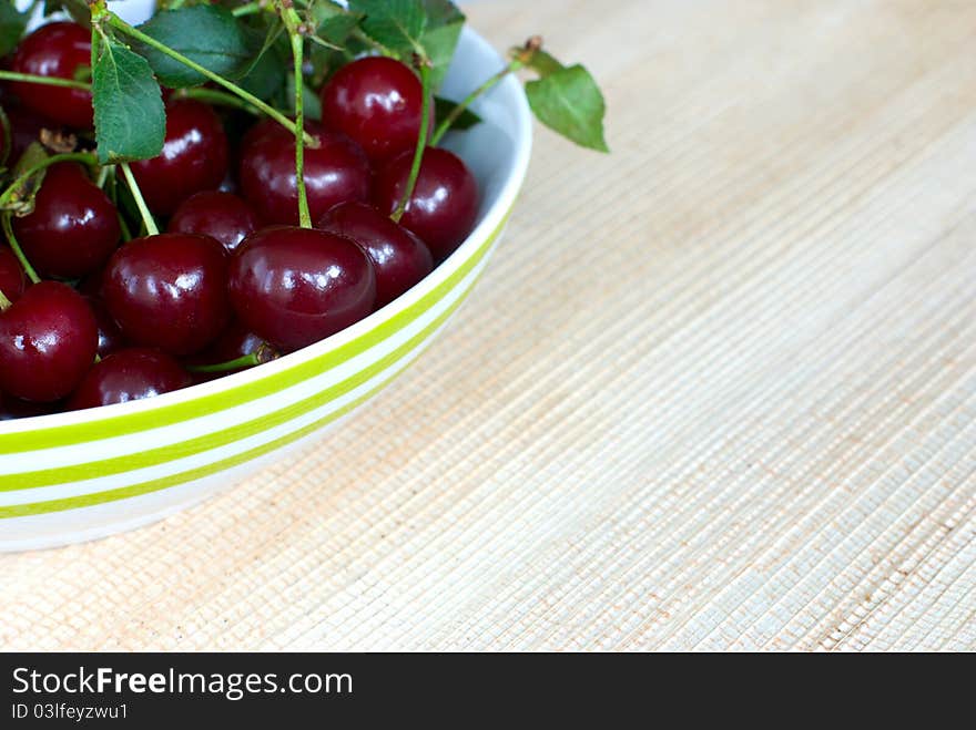 Lot of ripe cherries on a plate. Lot of ripe cherries on a plate