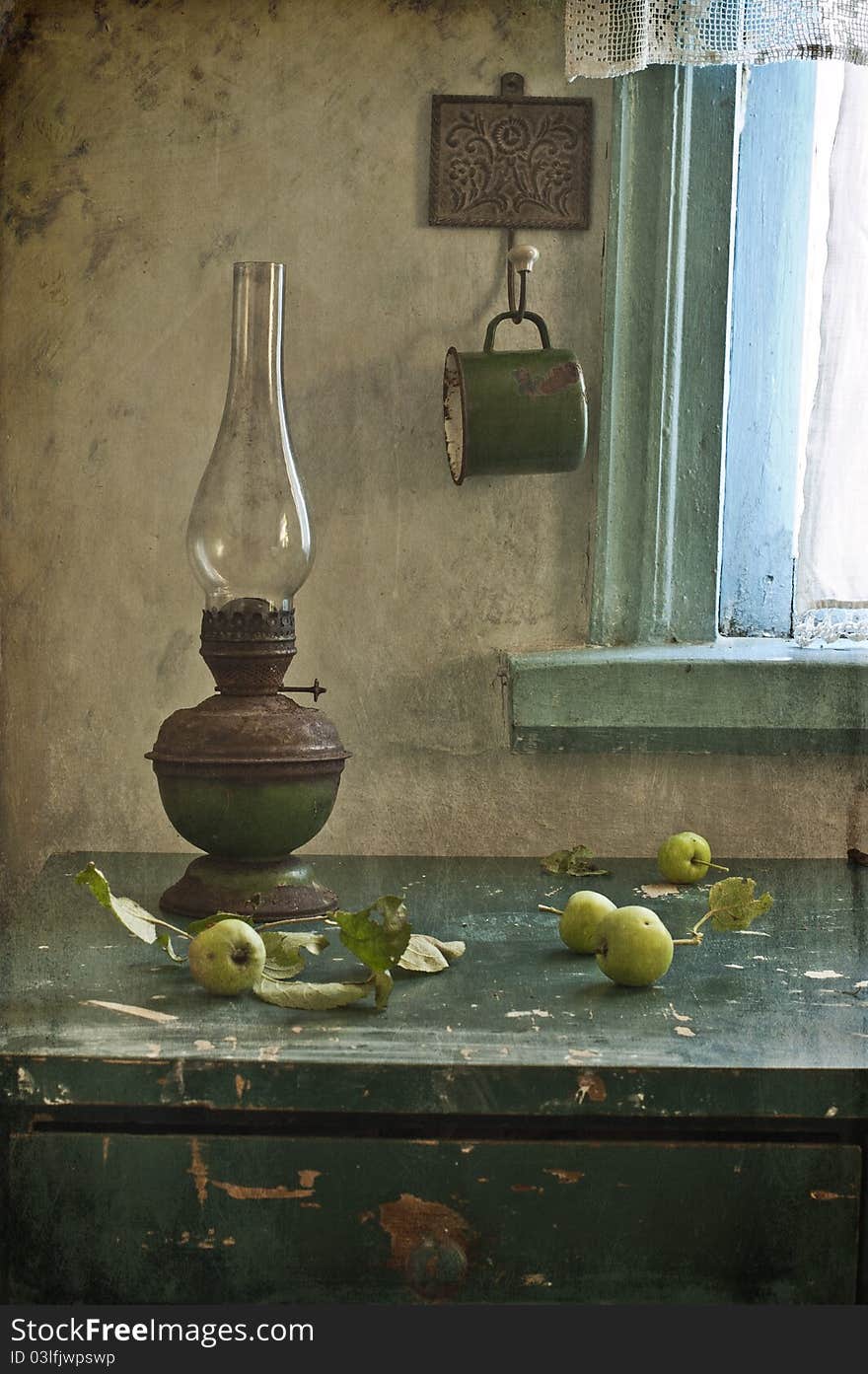 Still life with green apples and kerosene lamp. Still life with green apples and kerosene lamp