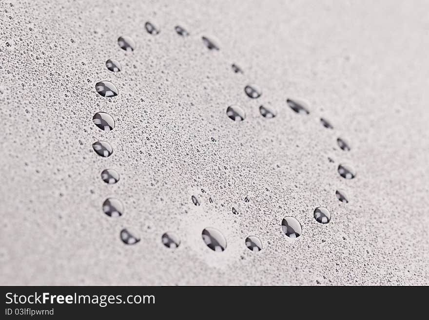 Close-up Photo of Water Drops .Heart composed of water droplets. Close-up of studo shot. Close-up Photo of Water Drops .Heart composed of water droplets. Close-up of studo shot.