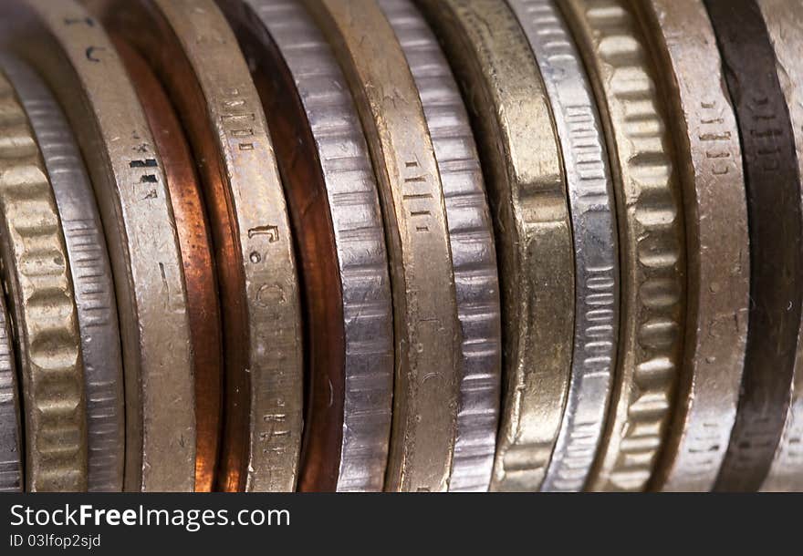 Stack of metal coins of the different countries. Stack of metal coins of the different countries