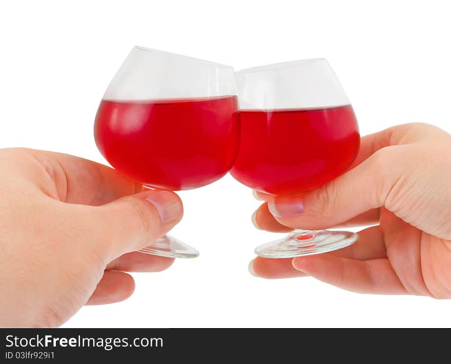 Hands and wineglasses isolated on white background