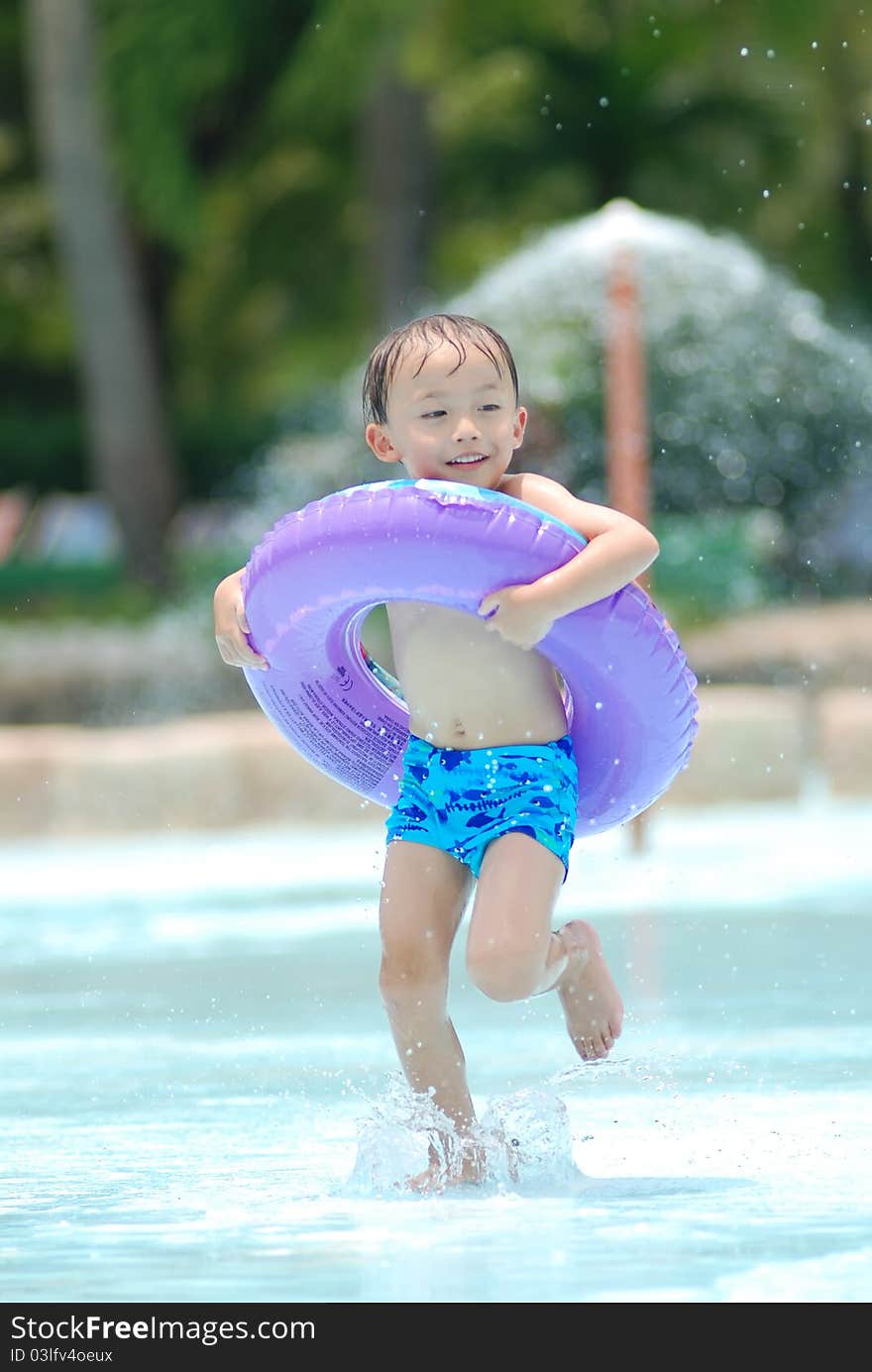 Asian young boy activity on the beach