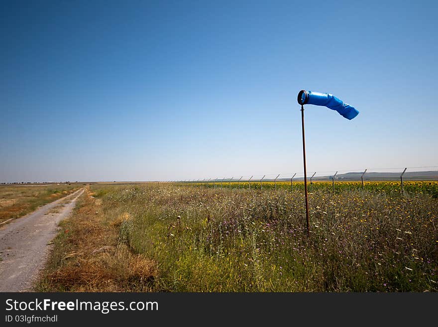 Wind sleeve near road to airport